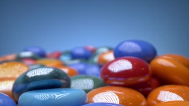 Super closeup details of artificial multicolored pebbles. decorative background — Stock Video