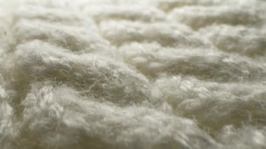 Makro. Tekstil arka planı. beyaz yün örgü kumaş dokusu