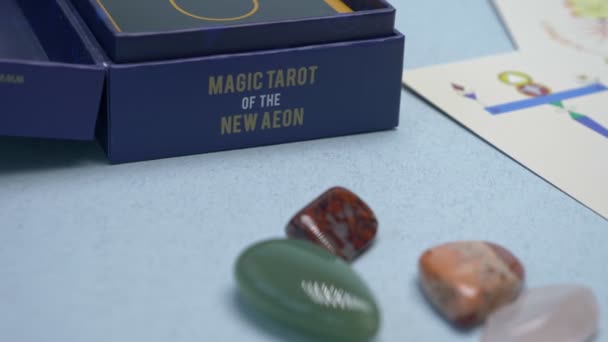 Editorial. Russia Sochi 07/04/2020. magic background, tarot cards and magic attributes on the table — Stock Video
