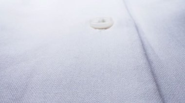 Düğme aşağı bluzun süper yakın elementleri. tekstil arkaplanı
