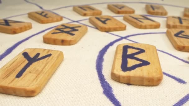 Super close up. the details. set of wooden runes on canvas — Stock Video