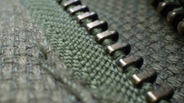 Süper yakın plan, fermuarlı fermuarlı kıyafetler. tekstil arkaplanı