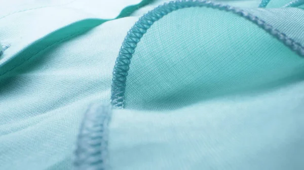 Super detailní. prvky jemné modré blůzy s volánky. textilní pozadí — Stock fotografie