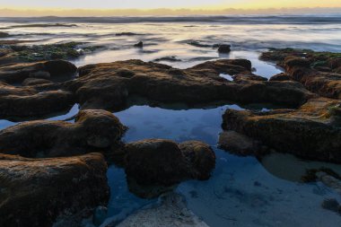 Scenic Panoramic Sunset Landscape of Distant La Jolla Shores and Pacific Ocean from San Diego, California clipart