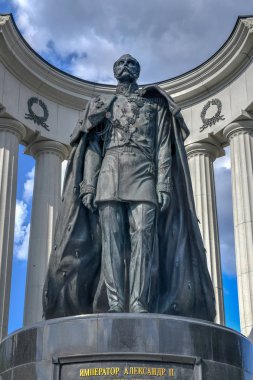 A monument to Alexander II outside the Cathedral of Christ the Savior in Moscow, Russia. clipart