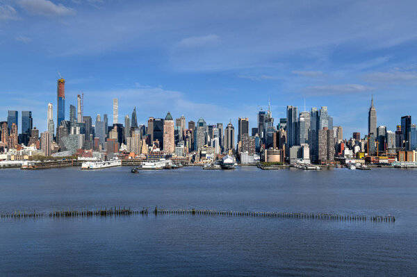 New York City - April 21, 2019: Panoramic view of the New York City skyline from Hamilton Park, Weehawken, New Jersey.
