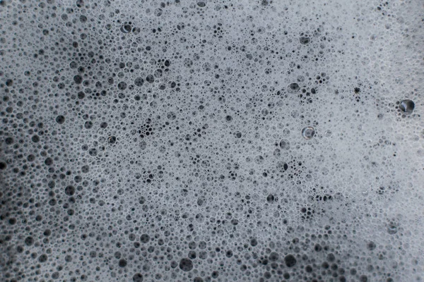 Beyaz Köpük koyu arka plan üzerinde