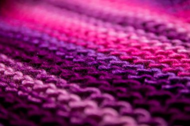 Pembe, beyaz ve mor çizgili örme doku arka plan