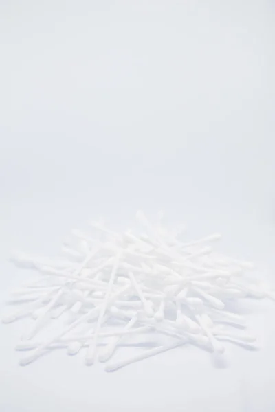 Vertical banner with cotton buds heap isolated on the white copy space background — Stock Photo, Image