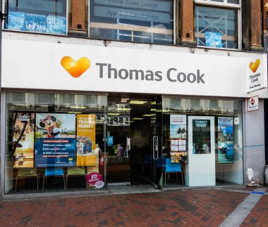 Reading, United Kingdom - May 09 2018:   The frontage of Thomas Cook Travel Agent shop in Broad street clipart