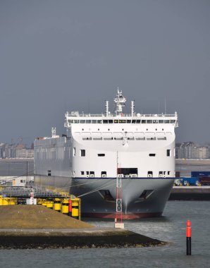 Zeebrugge, Belgium - April 28 2018:   The cargo ship Celine, the world's largest Roll On Roll Off cargo vessel. docked in Zeebrugge harbor clipart