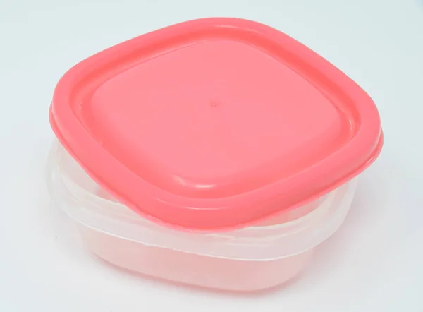 Pudełko różowy osłoniętego tupperware — Zdjęcie stockowe