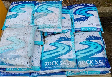 Reading, United Kingdom - February 14 2020:  Sacks of Rock salt for gritting roads to prevent Ice on Pincents lane clipart