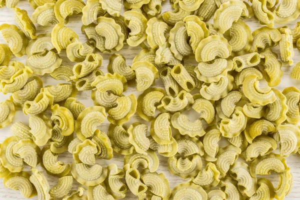 Pasta Spinach Creste Gallo Raw Top View Isolated Grey Wood — стоковое фото