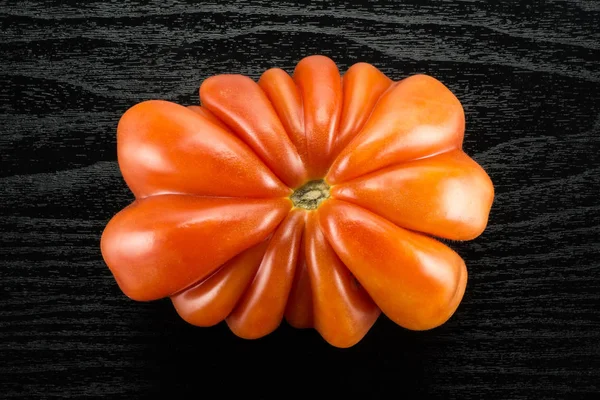 Beef Tomato Flower Shape Top View Isolated Black Wood Background — Stock Photo, Image