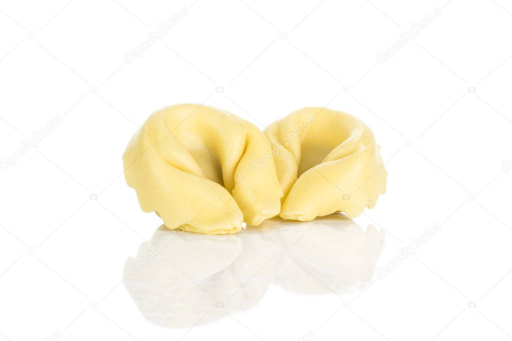 Two raw tortellini Italian pasta isolated on white backgroun