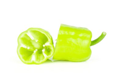 Group of two halves of light green bell pepper isolated on whit clipart