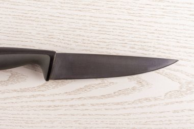 Bir bütün mutfak aracı paslanmaz çelik Şef bıçak flatlay gri Wood