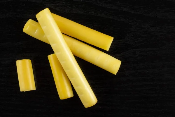 Group Five Whole Smoked Slovak String Cheese Stick Flatlay Black — Stock Photo, Image