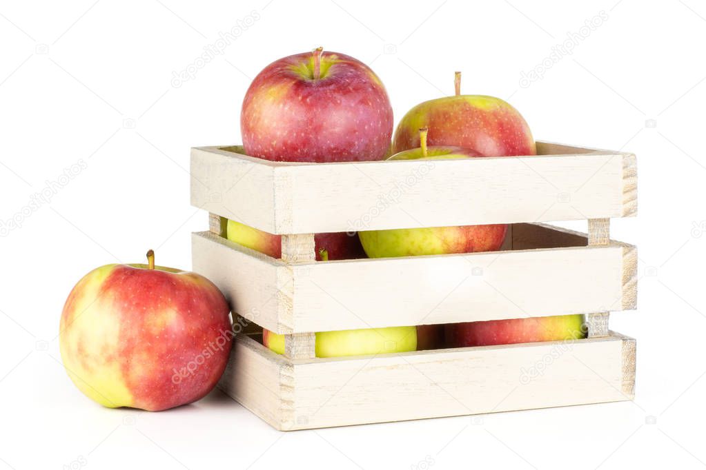 Lot of whole glossy fresh red apple james grieve variety with wooden crate isolated on white background