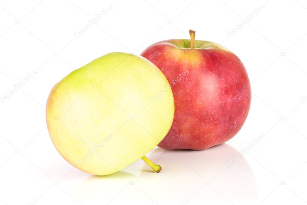 Group of two whole fresh red apple james grieve variety isolated on white background
