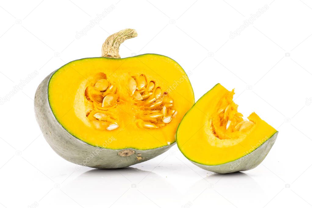 Group of one half one slice of fresh blue grey pumpkin nagy dobosi variety with seeds isolated on white background