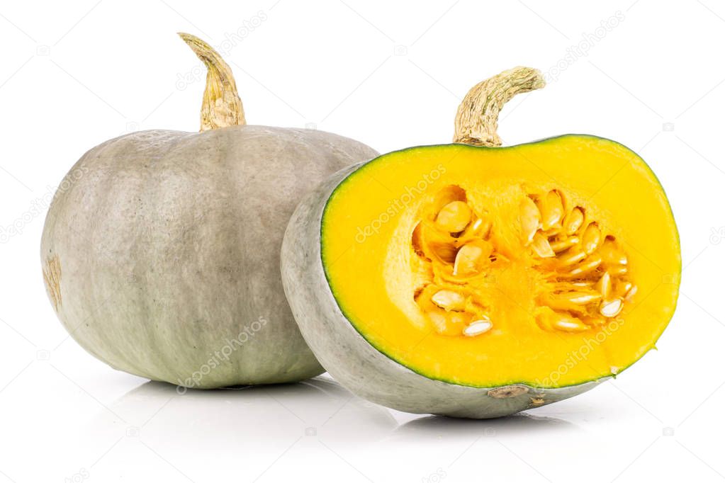 Group of one whole one half of fresh blue grey pumpkin nagy dobosi variety with seeds isolated on white background