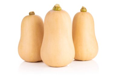 Beyaz arka plan üzerinde izole turuncu Balkabagi waltham çeşitli grup üç tamamen pürüzsüz armut şeklinde