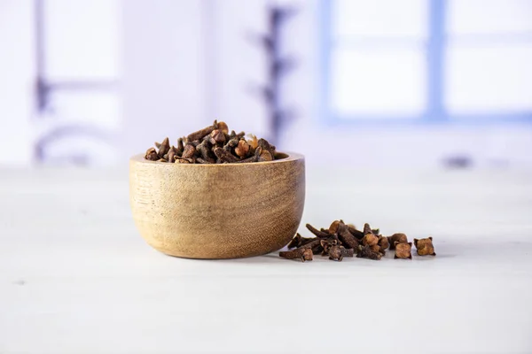 Small dried cloves spice with blue window — Stock Photo, Image