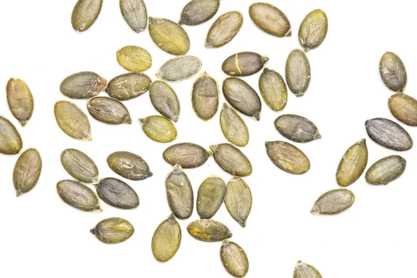 Hulled pumpkin seeds isolated on white — Stock Photo, Image