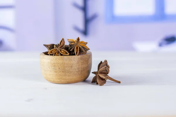 Dry brown star anise fruit with blue window