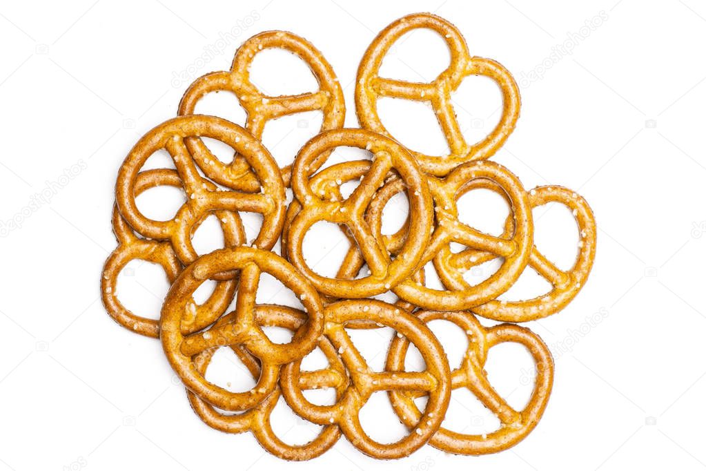 Mini salted pretzels isolated on white