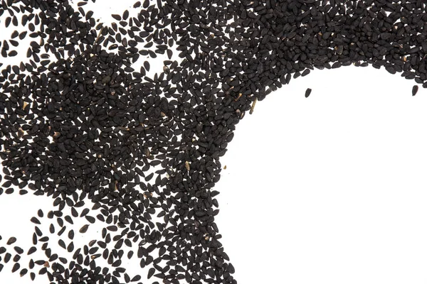 Sementes de cominho preto isoladas em branco — Fotografia de Stock