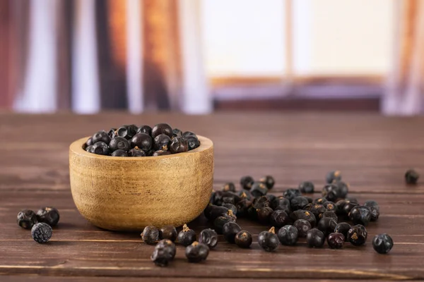 Dry juniper berries with curtains — Stock Photo, Image