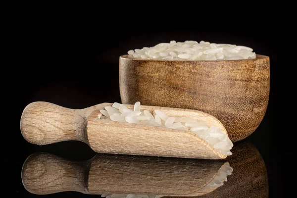 Arroz de jazmín blanco aislado en vidrio negro — Foto de Stock