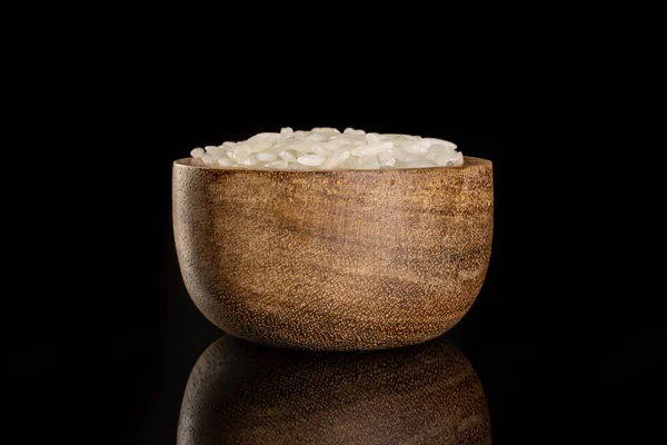 White jasmine rice isolated on black glass — 스톡 사진