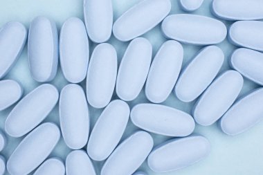 Açık mavi mavi mavi tıbbi haplar