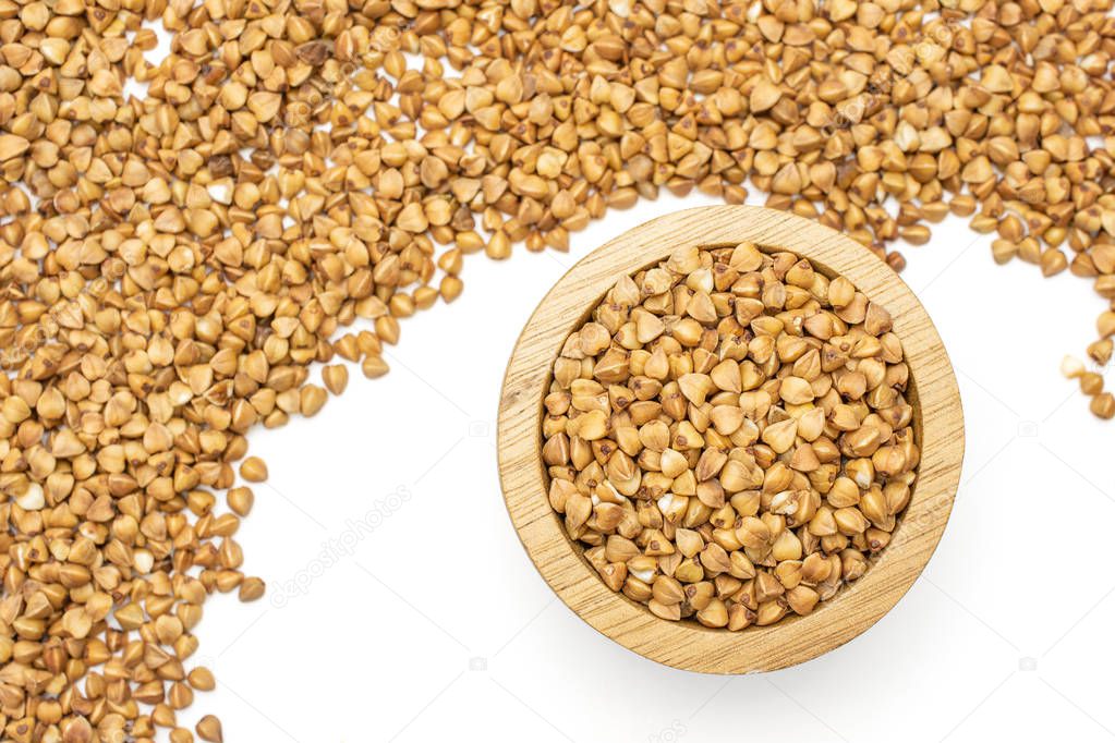 Raw buckwheat grain isolated on white