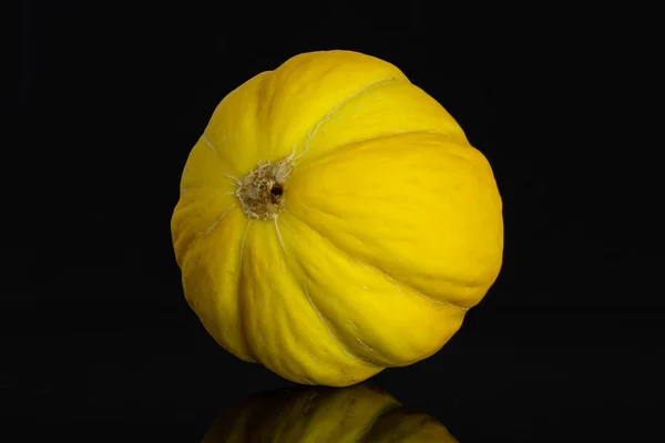 Melone canarino giallo isolato su vetro nero — Foto Stock