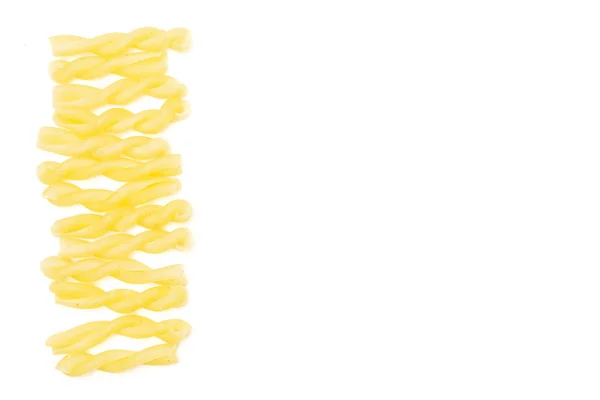 Raw pasta gemelli isolated on white — Stock Photo, Image