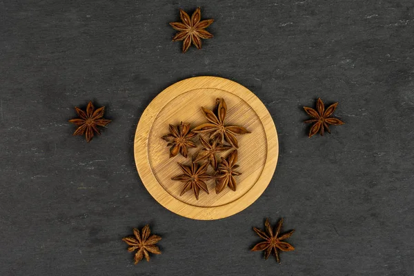 Dry star anise on grey stone