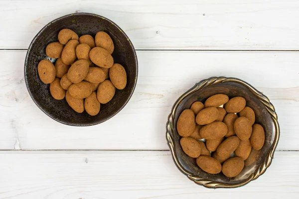 Chocolate canela almendra sobre madera gris — Foto de Stock