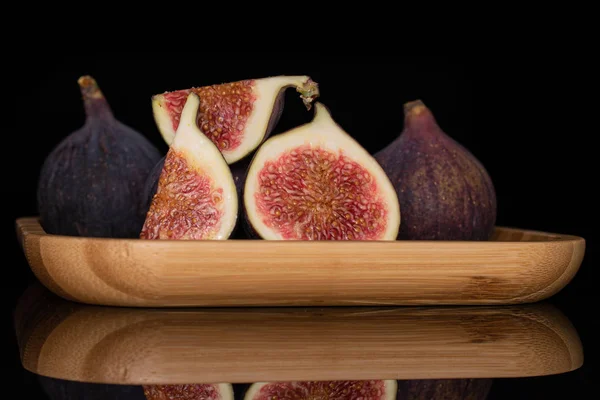 Fresh fig fruit isolated on black glass — Stock Photo, Image