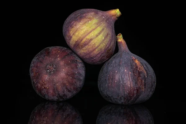 Fresh fig fruit isolated on black glass — Stock Photo, Image