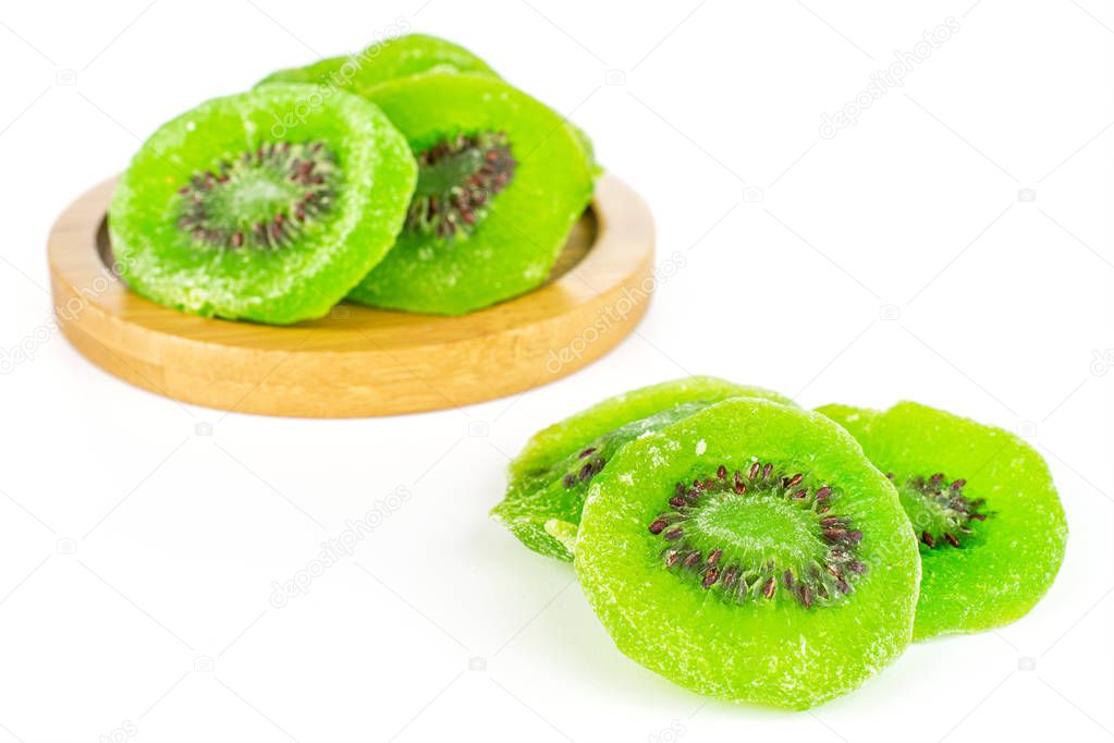 Sweet candied kiwifruit isolated on white