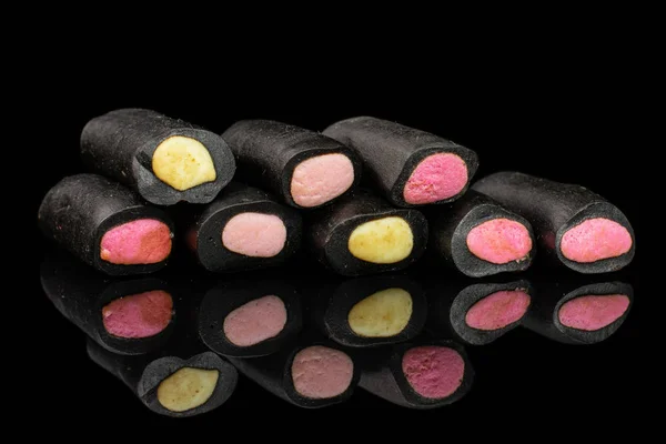 검은 감초 사탕 에 고립 된 검은 유리 — 스톡 사진