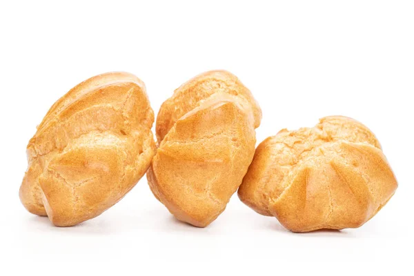 Gouden gebakken profiterole geïsoleerd op wit — Stockfoto