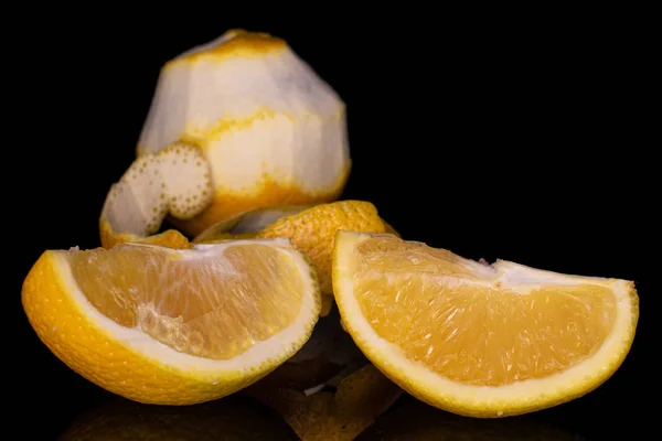 Fresh bright orange isolated on black glass — Stock Photo, Image