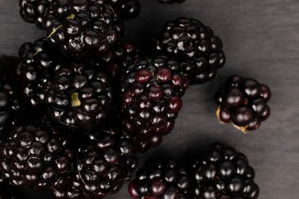 Fresh blackberry on grey stone — Stock Photo, Image