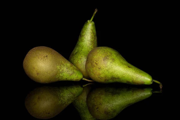 Fresh green pear isolated on black glass — Stock Photo, Image